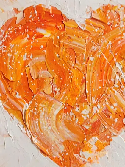 This heart is all about warmth and passion, with fiery oranges and whites swirling together. The texture is so thick you can see every mark of the palette knife. It’s a small piece that carries a lot of energy.