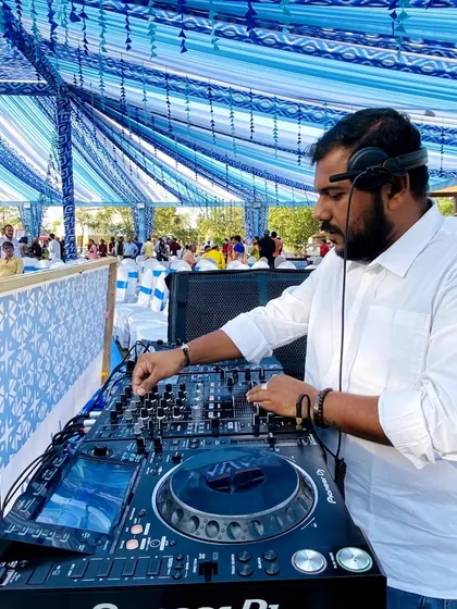 A clear view of my professional DJ console in action. I use industry-standard Pioneer DJ gear because I don't believe in quick fixes. Your wedding deserves full quality sound, and that's what I guarantee.