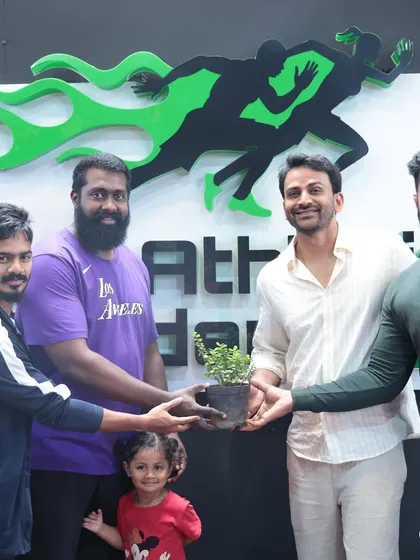 Presenting a plant to a guest, a symbol of growth and new beginnings at our academy.