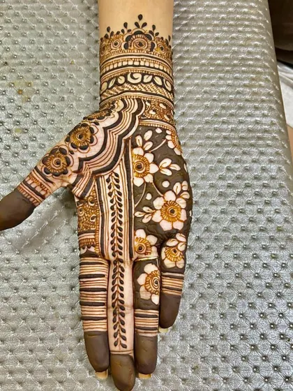 A close-up of the hand with the dense floral pattern. The shading gives it such a beautiful depth.