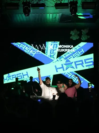 The visuals for the Matcha Rave were designed to be fresh and vibrant. Here you can see the custom blue and green graphics on the LED screen, matching the unique theme of the event.