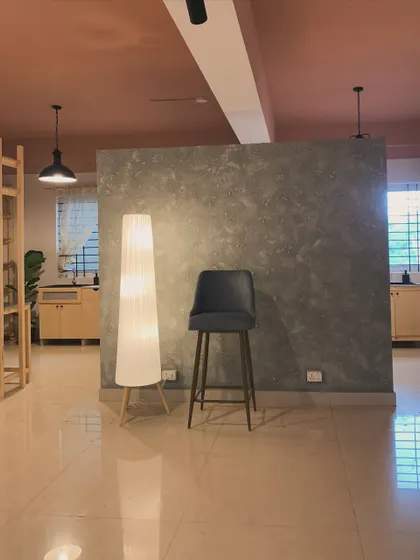The interplay of light and shadow against our textured wall. We believe the environment you create in deeply impacts your work, so we've focused on making our studio a visually soothing space.