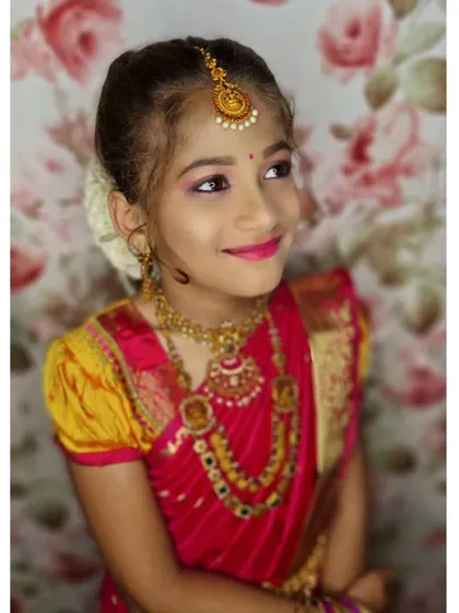 Another adorable portrait of my niece, looking bright and happy in her full traditional attire.