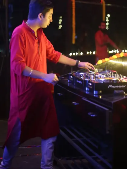 A full-length view of my setup at an outdoor event. I can set up my professional gear anywhere to bring the party to you.
