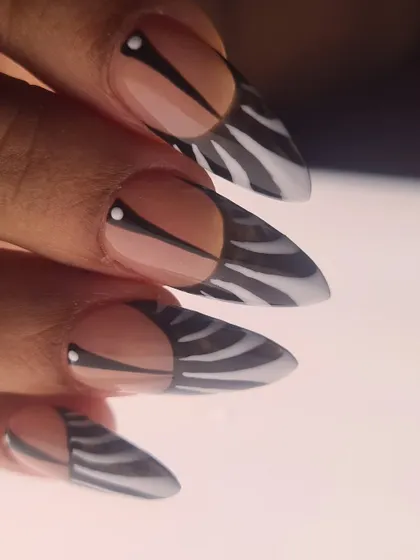 Another angle of the modern zebra print, highlighting the negative space near the cuticle that gives it a unique, contemporary edge.