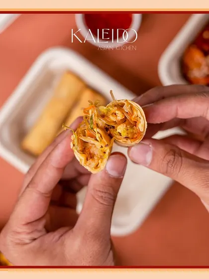 Here's a look inside my crispy spring rolls. They are packed with fresh, crunchy vegetables and served with a Thai-inspired dipping sauce.