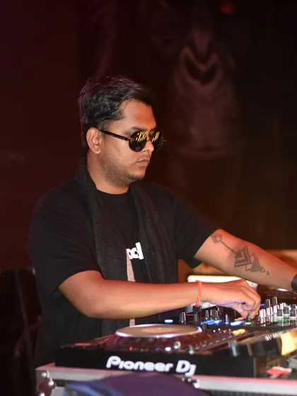 Another angle from my set, showing my hands on the Pioneer DJ mixer, tweaking the sound for the perfect transition.