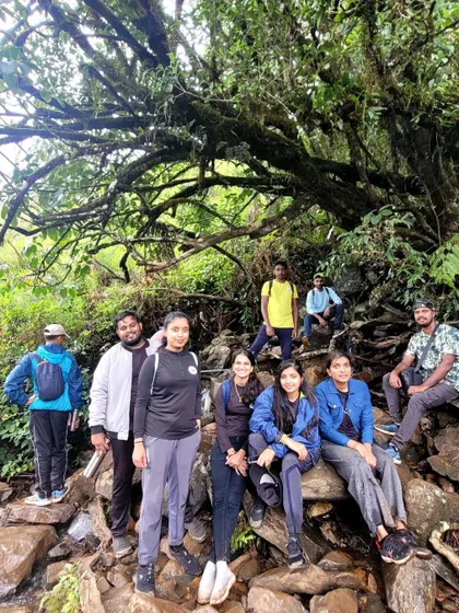 Taking a break on a rocky patch inside the shola forest section of the Kudremukha trail.
