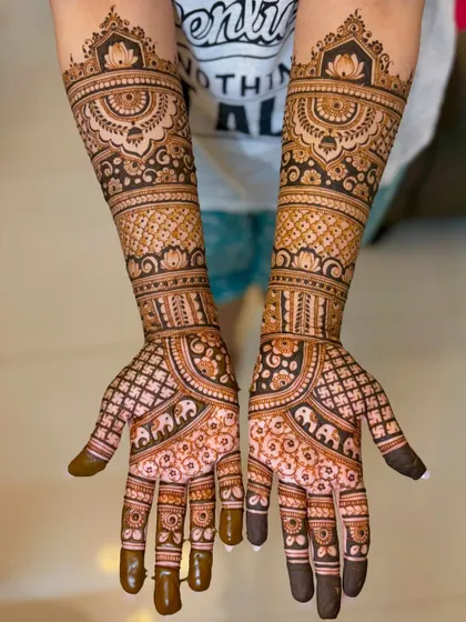 A clear, top-down shot of Nikita's traditional wedding mehendi.