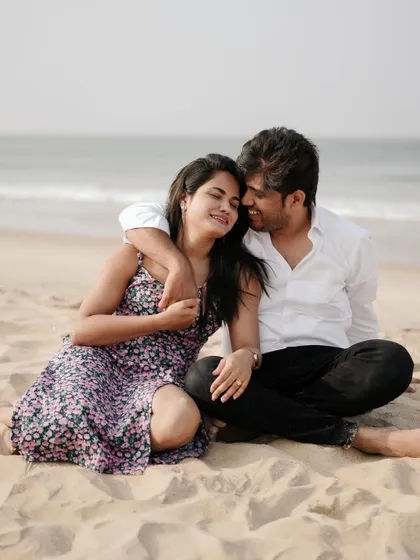 Sitting together on the sand, lost in their own world. A beach pre-wedding shoot offers so many opportunities for relaxed and romantic photos.