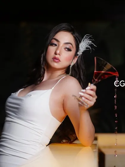 A Merry Christmas shot from my retro Bollywood shoot. The spilled wine adds a touch of drama and artistry to this glamorous photo.