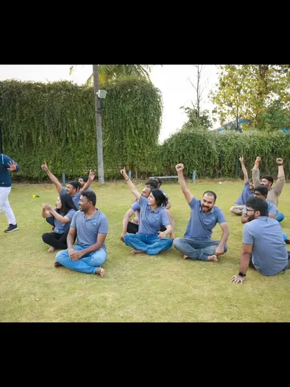 A moment of triumph during a team building game. Seeing the excitement and collaborative spirit is what makes these sessions so successful.