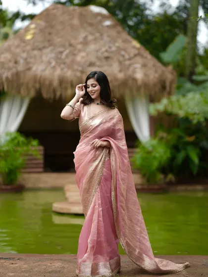 Another shot of this graceful pink saree, perfect for any special occasion.