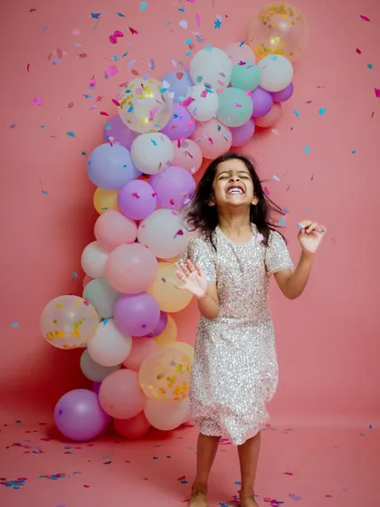 This is what the energy of a "crazy 5 year old" looks like. We love capturing the pure, unfiltered joy of childhood with fun confetti and colorful balloons.