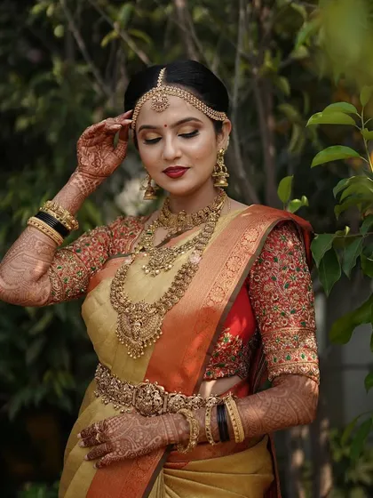 A candid moment of Taanya during her wedding ceremony, looking serene and beautiful.