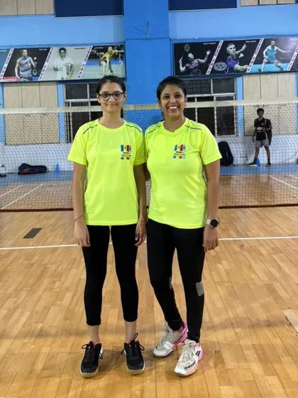 Two of our players in matching academy gear, ready for a training session. A shared uniform helps build a sense of identity and belonging within the Home Shuttlers family.