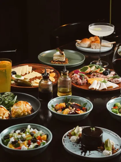 A glimpse of our lavish Sunday Brunch spread. This is more than a meal; it's a table full of stories waiting to be shared, featuring everything from fresh salads and artisanal cheese boards to decadent desserts.