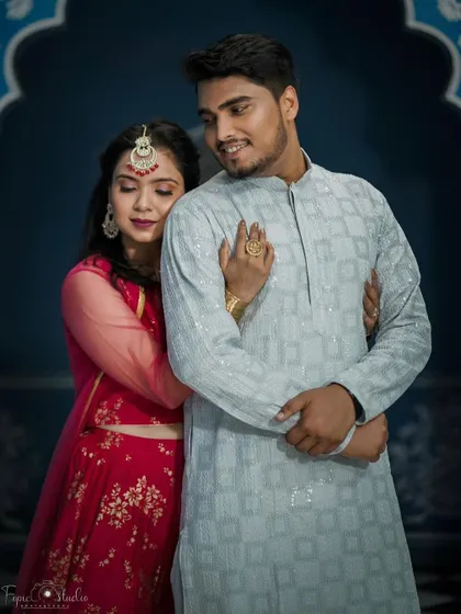 A romantic pose from the same event, showing how the makeup looks beautiful in a more intimate, close-up shot.