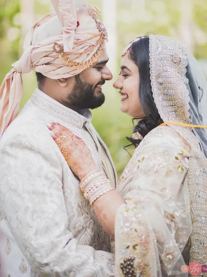 The look of love. Abhiram and Ayushi's smiles say everything in this happy, close-up wedding portrait.