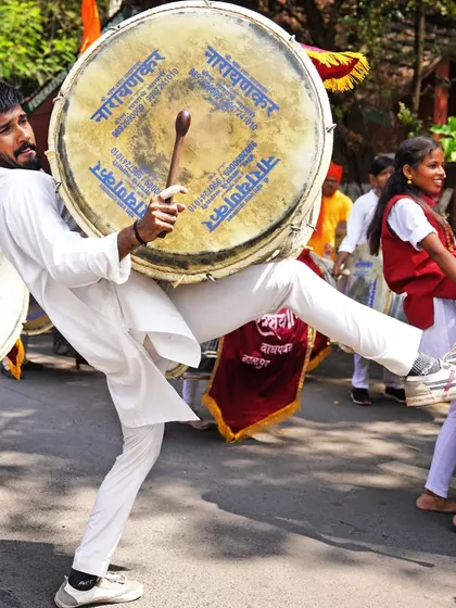 A high-energy kick mirrors the beat of the drum. My candid street photography aims to freeze these peak moments of action and cultural expression.