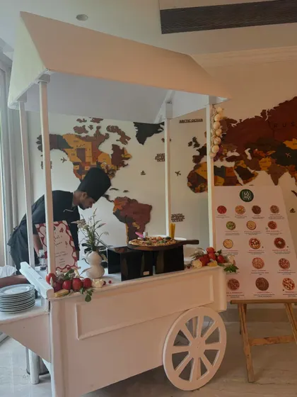 My versatile white pizza cart can be set up indoors as well. Here it is at a Halloween-themed party, ready to serve fresh Neapolitan pizzas to guests.