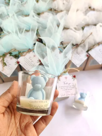 A single teddy bear votive candle, beautifully packaged with a custom thank you card. This shows the complete, ready-to-gift favor.