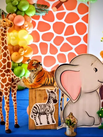 Detail shot of the cute elephant and giraffe props from a safari party.