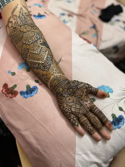 This is a detailed view of my intricate bridal henna work. Each design is unique, combining traditional patterns like paisleys and mandalas with fine-line fillers to create a stunning, full-coverage look for your special day.