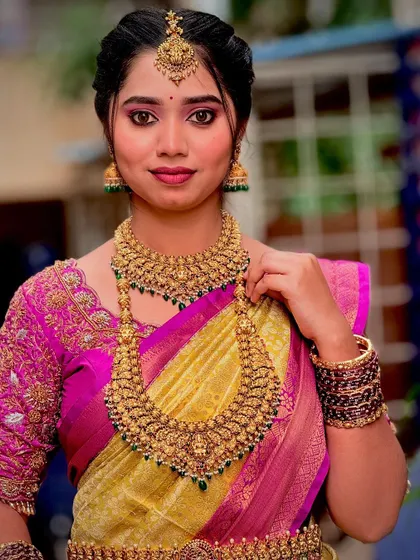A close-up portrait highlighting the beautiful craftsmanship of the choker and haaram.
