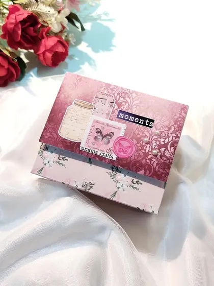 The cover of the vintage mini scrapbook, featuring antique-style embellishments and a wax seal effect.