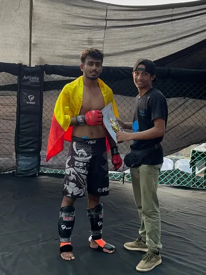Another win for the team in Goa. Our fighter, Sriharsha, proudly holds his certificate after a victorious bout at Art of Combat.