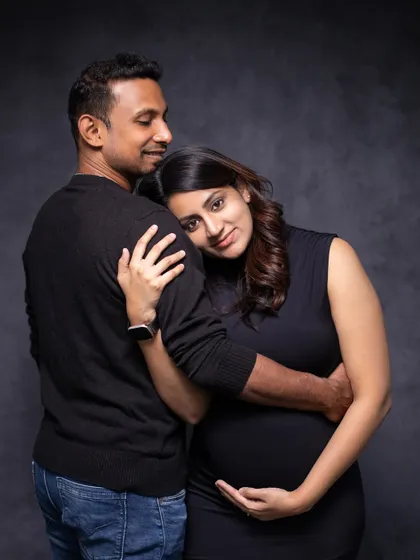 A tender moment of embrace, captured in our studio. This pose is perfect for creating a feeling of safety and love.