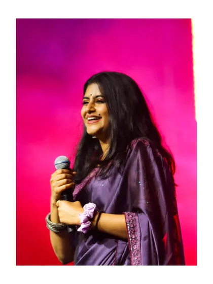A happy moment captured during a live show. The joy of performing for a live audience is truly special.