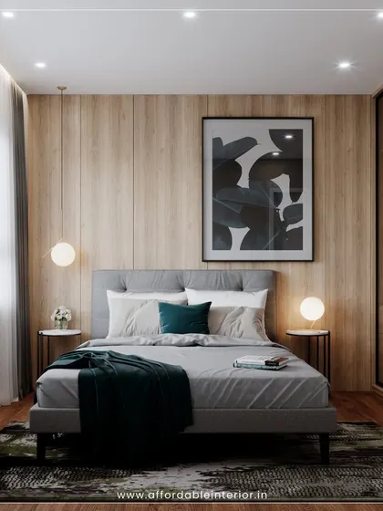 This bedroom combines a wood-paneled accent wall with a comfortable grey upholstered bed and modern abstract art, creating a warm and contemporary retreat.