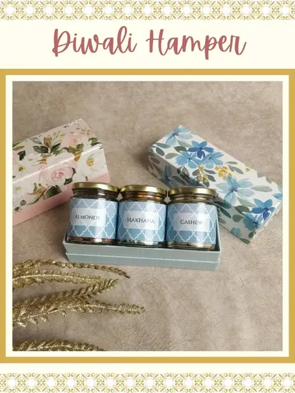 A simple yet beautiful Diwali gift set containing three jars of dry fruits. The jars come in a floral-printed box, making it an easy and elegant gift.
