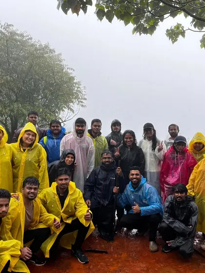 A sea of yellow ponchos. Our trekkers are always prepared for the unpredictable monsoon weather, ensuring the fun never stops.