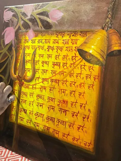 This spiritual artwork features sacred mantras and temple bells, evoking a sense of devotion and inner peace. It is part of our "Tune of Inner Journey" exhibition, which explores themes of spirituality and self-discovery.