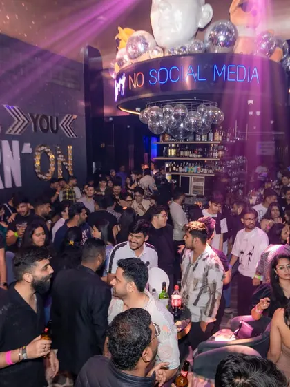 Another angle from the packed floor at Toy Room Pune. The club's unique decor and my music create a one-of-a-kind experience.