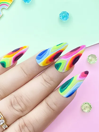 Explore your creativity with advanced materials. This vibrant, abstract design was created using colored acrylic powders, showcasing one of the many advanced techniques you'll master in our courses.