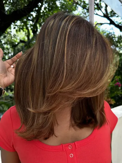 Be the life of every party with a great haircut and color. These highlights are strategically placed to catch the light and turn heads.