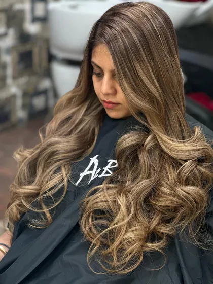 A portrait of the client, her golden blonde hair looking rich and luxurious.