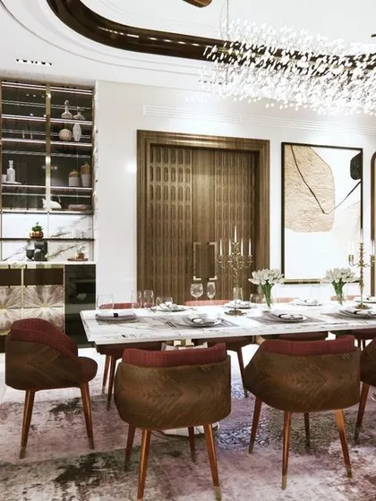 A wide-angle view showing the dining room's connection to other spaces through a modern black-framed partition. The design seamlessly blends different elements to create a cohesive and luxurious home interior.