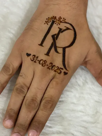A simple yet meaningful design for the groom or a close family member, featuring the couple's initials and the wedding date. The small leafy details add a touch of softness to the bold lettering.