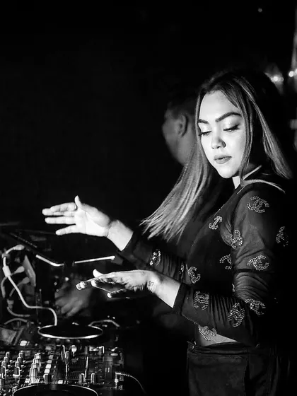 A classic black and white shot of me in action, with the caption "DJ at work."