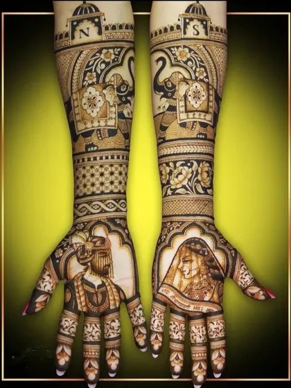 A complete bridal set featuring bride and groom portraits, elephant motifs, and personalized initials 'N' and 'S' at the top. This is a perfect example of a royal and personalized design.