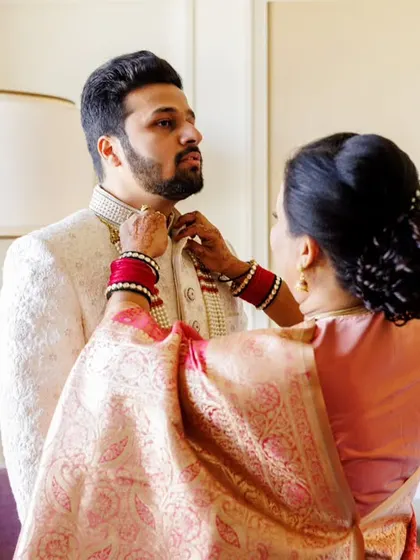 A final check from mom. These quiet, intimate family moments during the getting ready process are some of my favorites to capture.