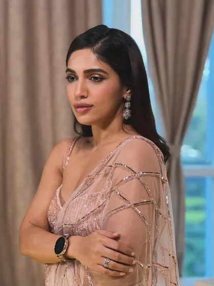 Bhumi Pednekar looking pretty in this delicate pink sequin saree. It's a soft, glamorous look that’s perfect for an evening reception or a festive party.