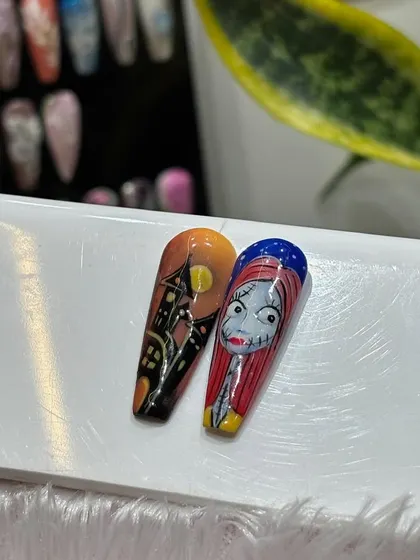 Another detailed shot from our Halloween collection, showcasing a haunted house against a full moon and the character Sally. Each design is a small canvas of spooky art.