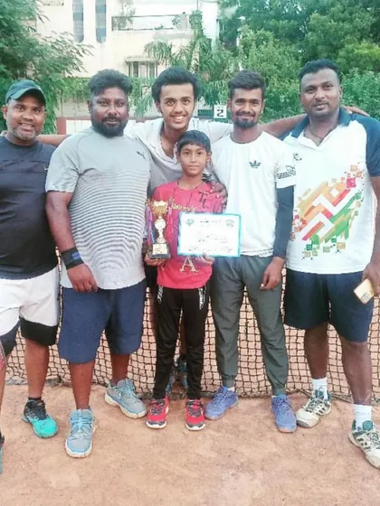 Our team congratulating ILTAian Ansh for his runner-up finish in an Under-12 tournament. We support our players on and off the court.