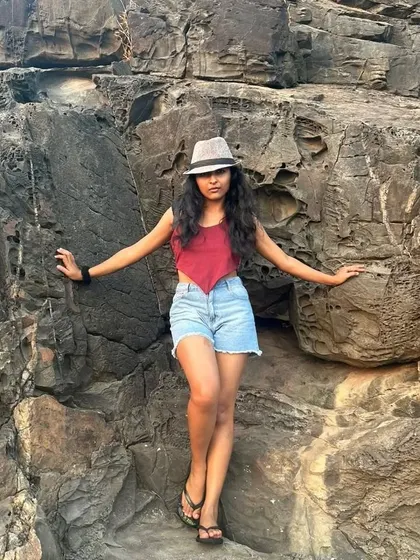 Posing against the unique rock formations at Devil's Finger, Goa. This travel shot combines adventure with a confident pose, showcasing my adventurous spirit.